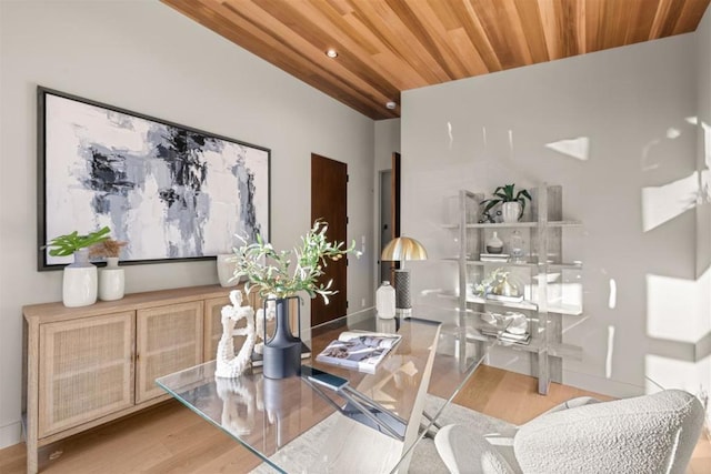 dining area featuring wood ceiling and light hardwood / wood-style floors