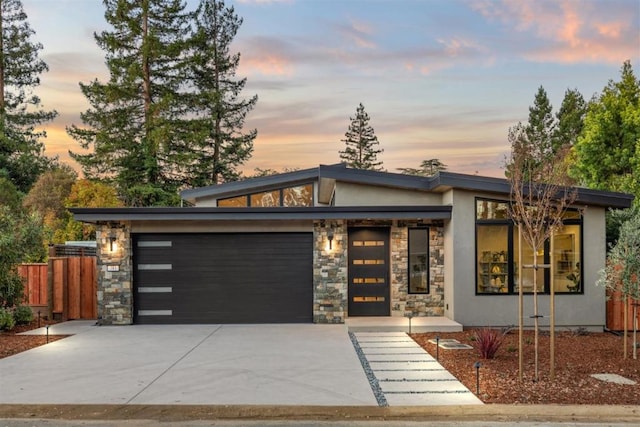 view of front of property featuring a garage