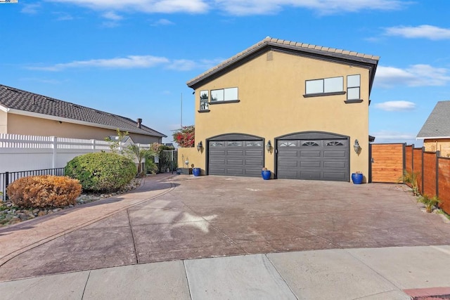 view of home's exterior with a garage