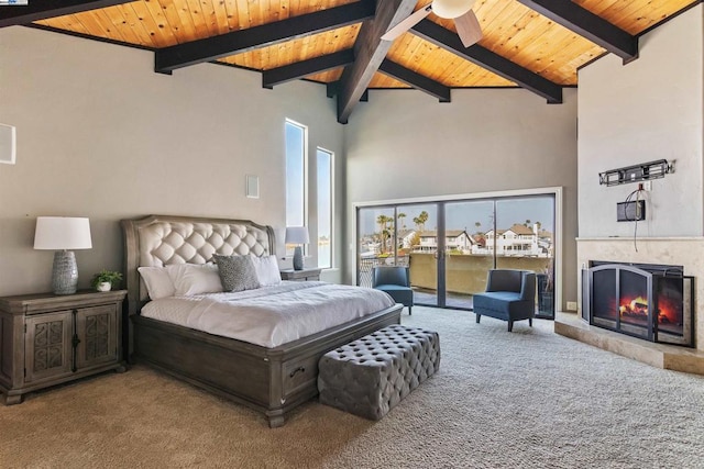 bedroom featuring beam ceiling, carpet, wooden ceiling, and high vaulted ceiling