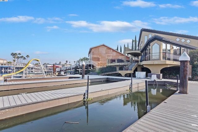 dock area with a water view