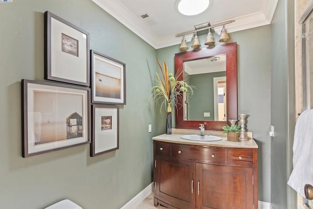 bathroom with vanity and crown molding