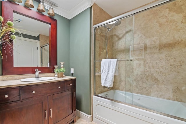 bathroom featuring vanity, enclosed tub / shower combo, and crown molding