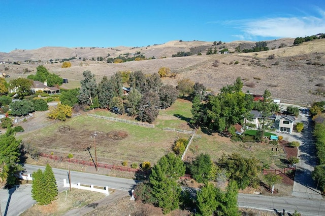 drone / aerial view featuring a mountain view