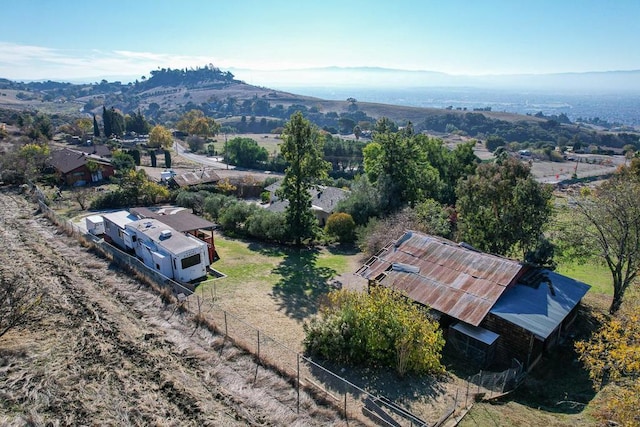 drone / aerial view featuring a mountain view