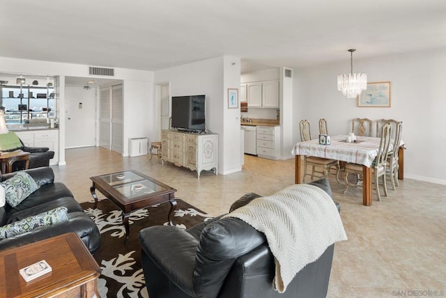 living room featuring a chandelier