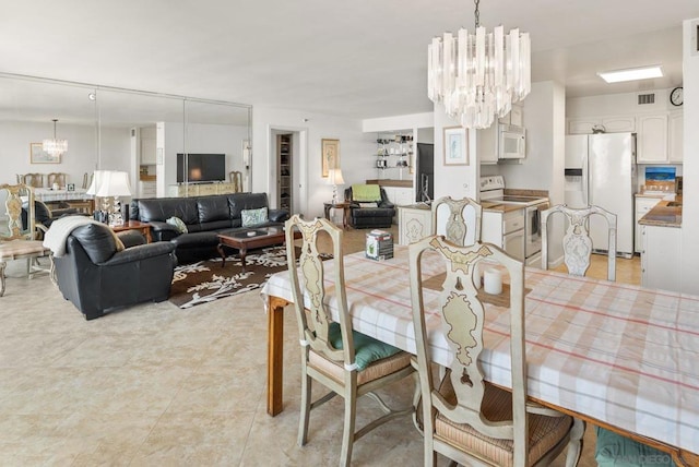 dining room featuring an inviting chandelier