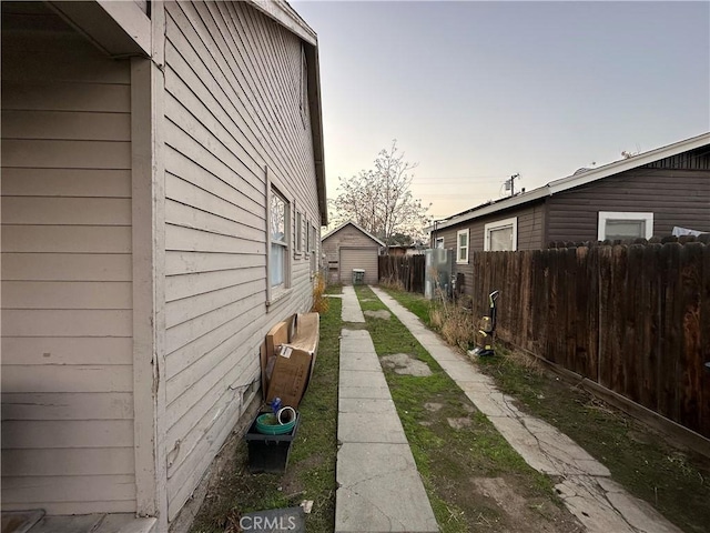 view of property exterior at dusk