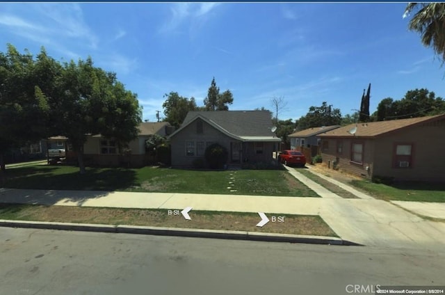 view of front of home with a front lawn