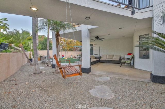 view of patio featuring ceiling fan and an outdoor hangout area