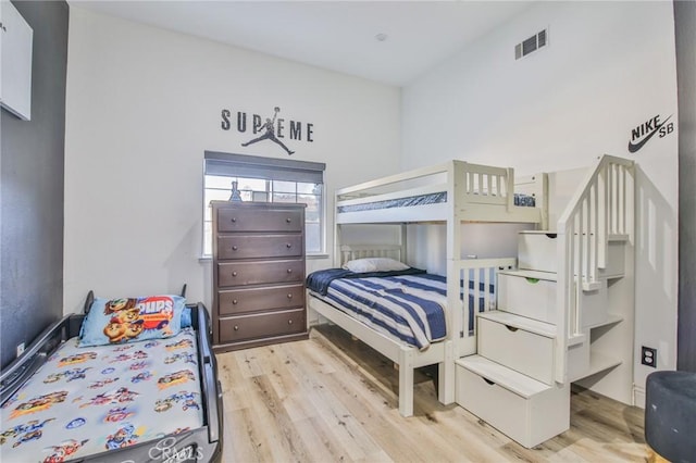 bedroom with light hardwood / wood-style flooring