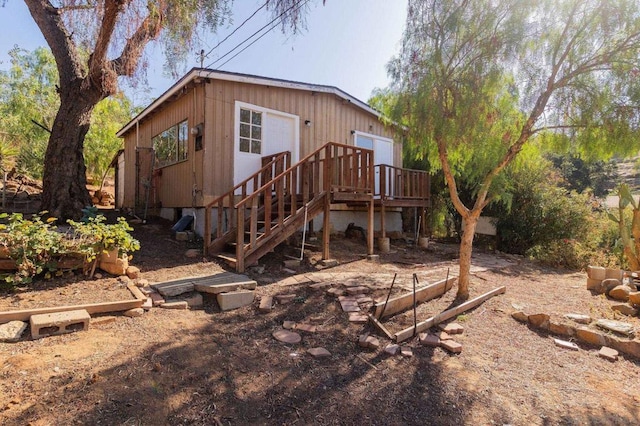 rear view of property with a deck