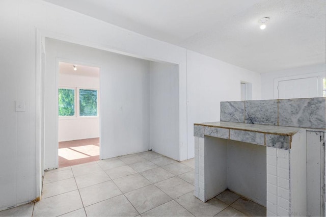 interior space featuring light tile patterned floors