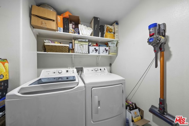 laundry room featuring washer and dryer