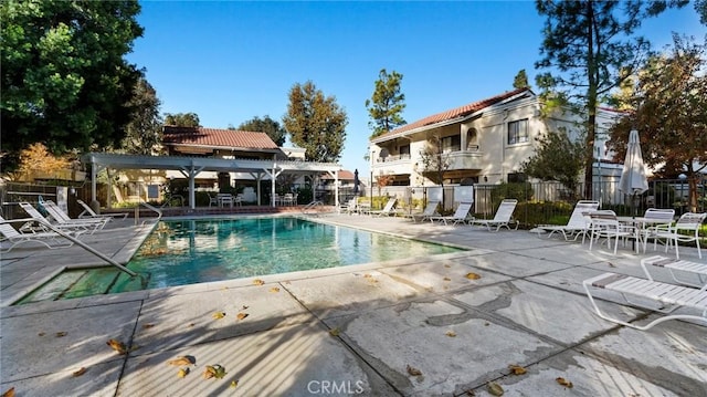 view of swimming pool with a patio