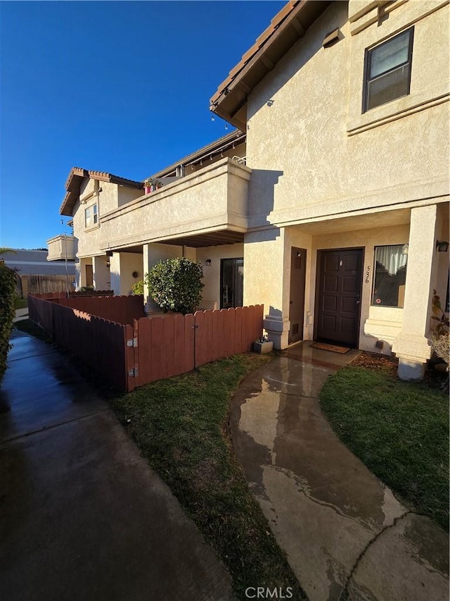 view of side of property featuring a garage