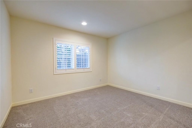 view of carpeted spare room