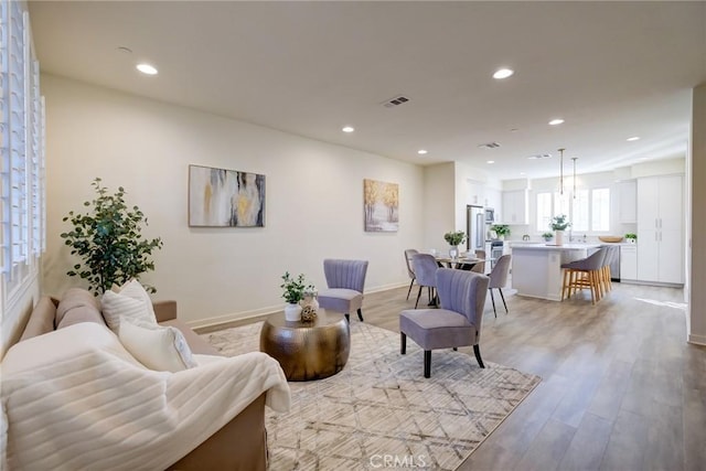 living room featuring light wood-type flooring