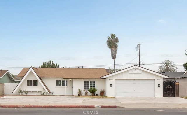 single story home featuring a garage