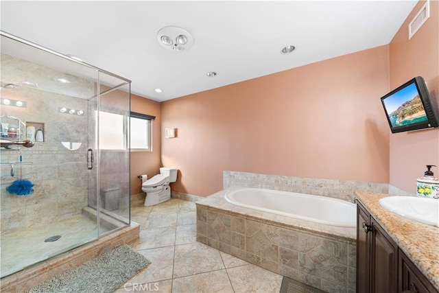 full bathroom with tile patterned floors, toilet, vanity, and shower with separate bathtub