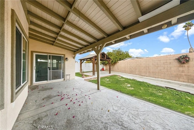 view of patio / terrace featuring a fenced backyard and a gazebo