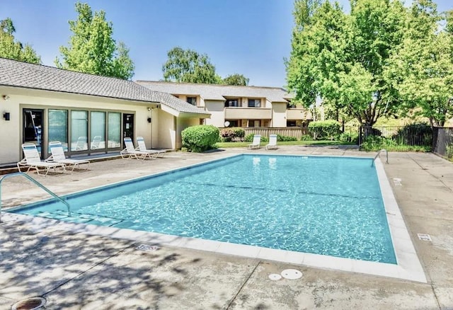 view of pool featuring a patio