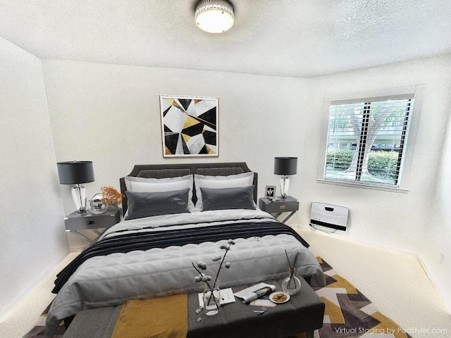 bedroom with a textured ceiling