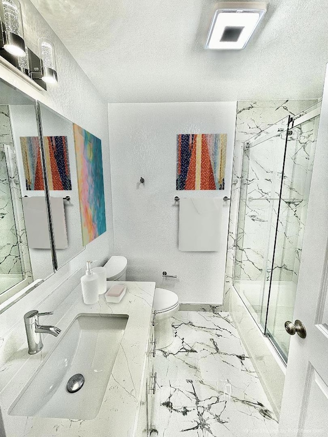 full bathroom with combined bath / shower with glass door, a textured ceiling, vanity, and toilet