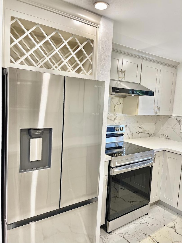 kitchen featuring backsplash and appliances with stainless steel finishes