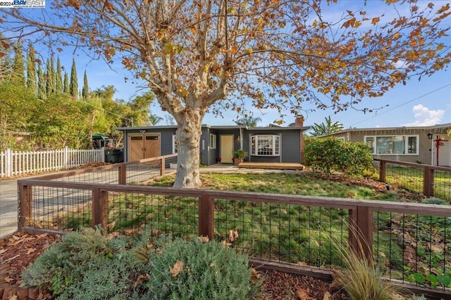 ranch-style home with a garage