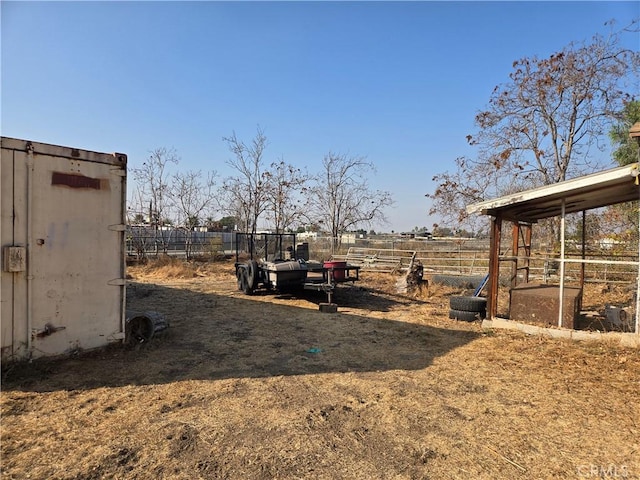 view of yard featuring an outdoor structure