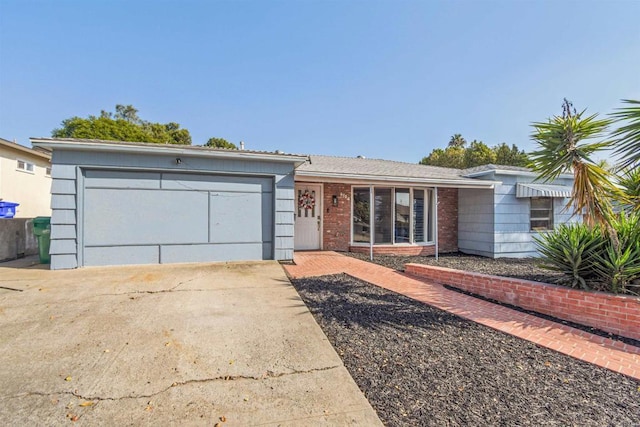 single story home with a garage