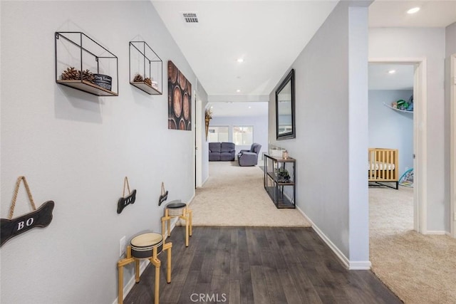 corridor featuring dark wood-type flooring