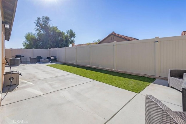 view of patio with an outdoor hangout area and central air condition unit