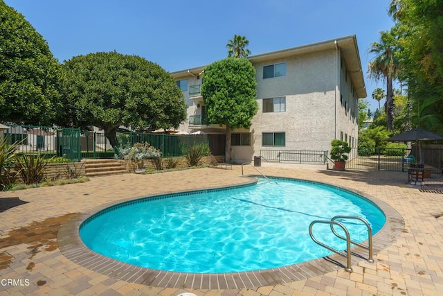 view of pool with a patio