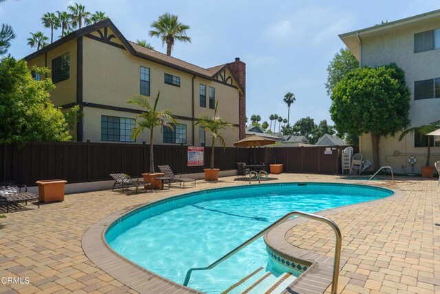 view of pool with a patio