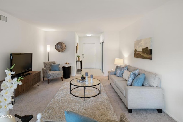 living room featuring light colored carpet