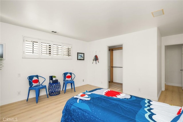 bedroom featuring hardwood / wood-style floors