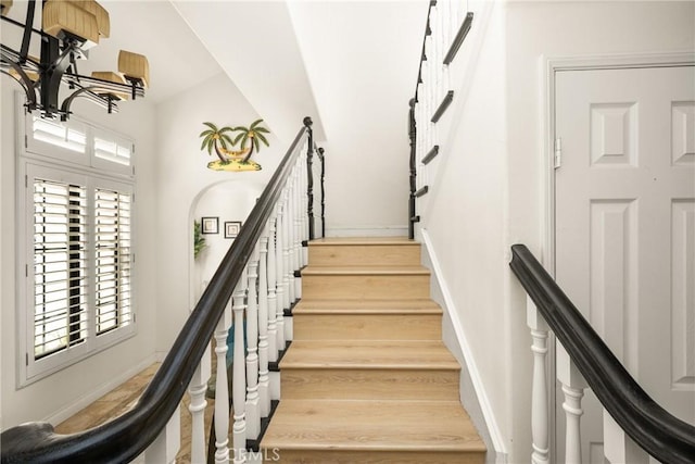 stairway with wood-type flooring