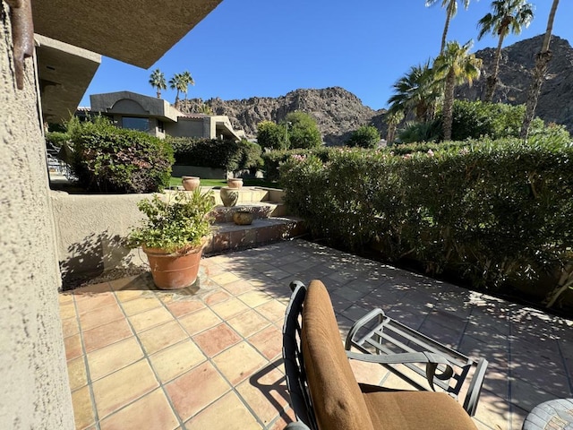 view of patio featuring a mountain view