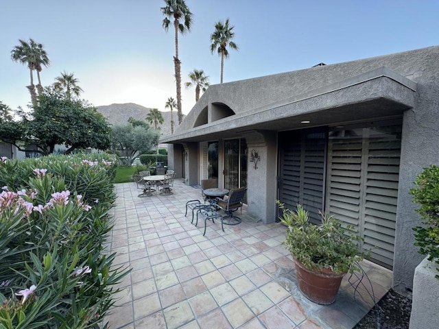 view of patio featuring a mountain view