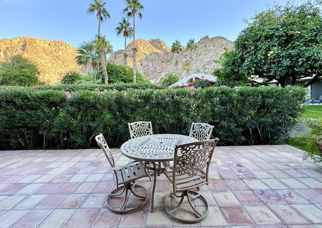 view of patio featuring a mountain view