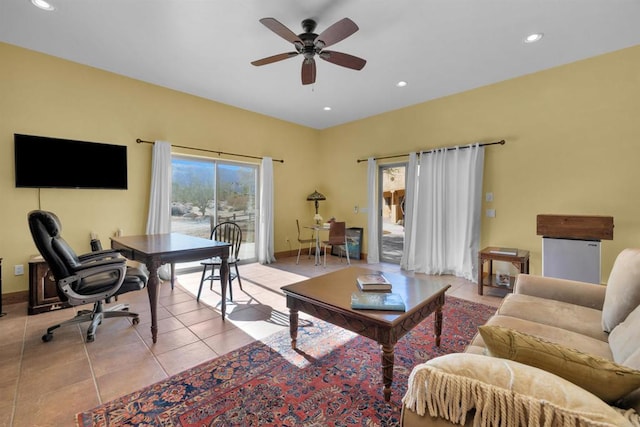 office with ceiling fan and light tile patterned floors