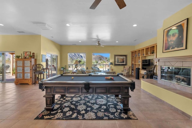 game room with plenty of natural light, light tile patterned flooring, and billiards