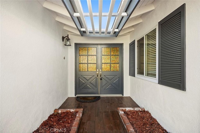 doorway to property featuring french doors