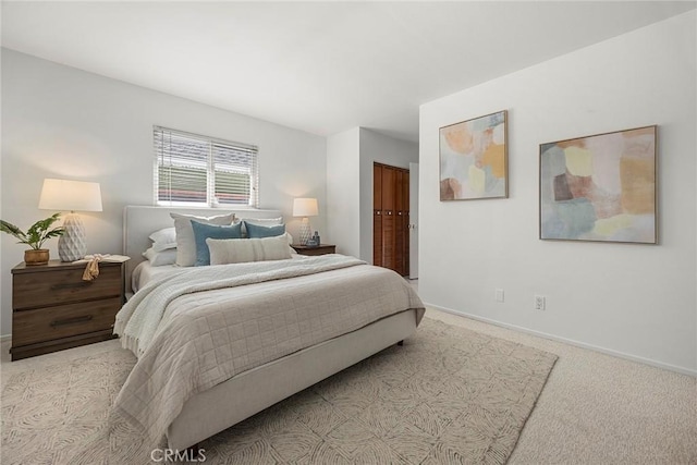 bedroom with light colored carpet