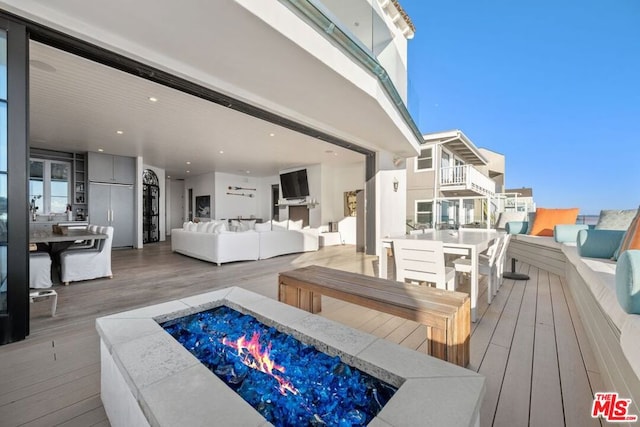 deck with a fire pit