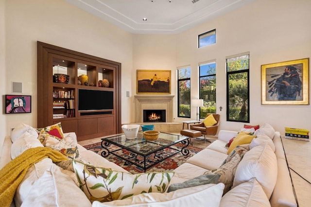 living room with a high ceiling