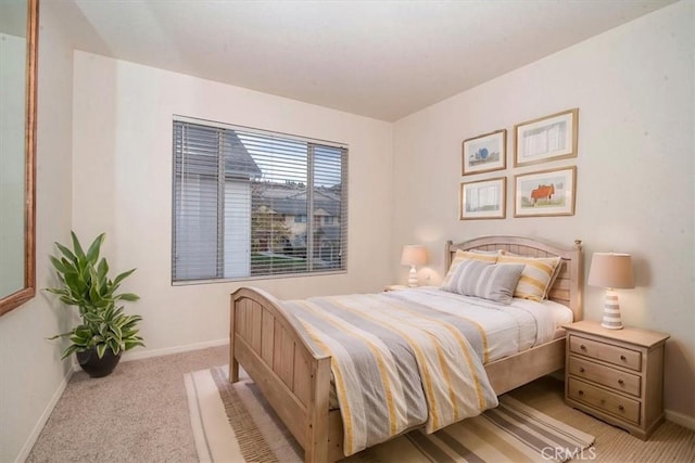 bedroom with light carpet