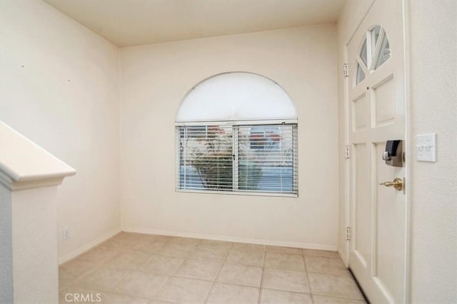 view of tiled spare room